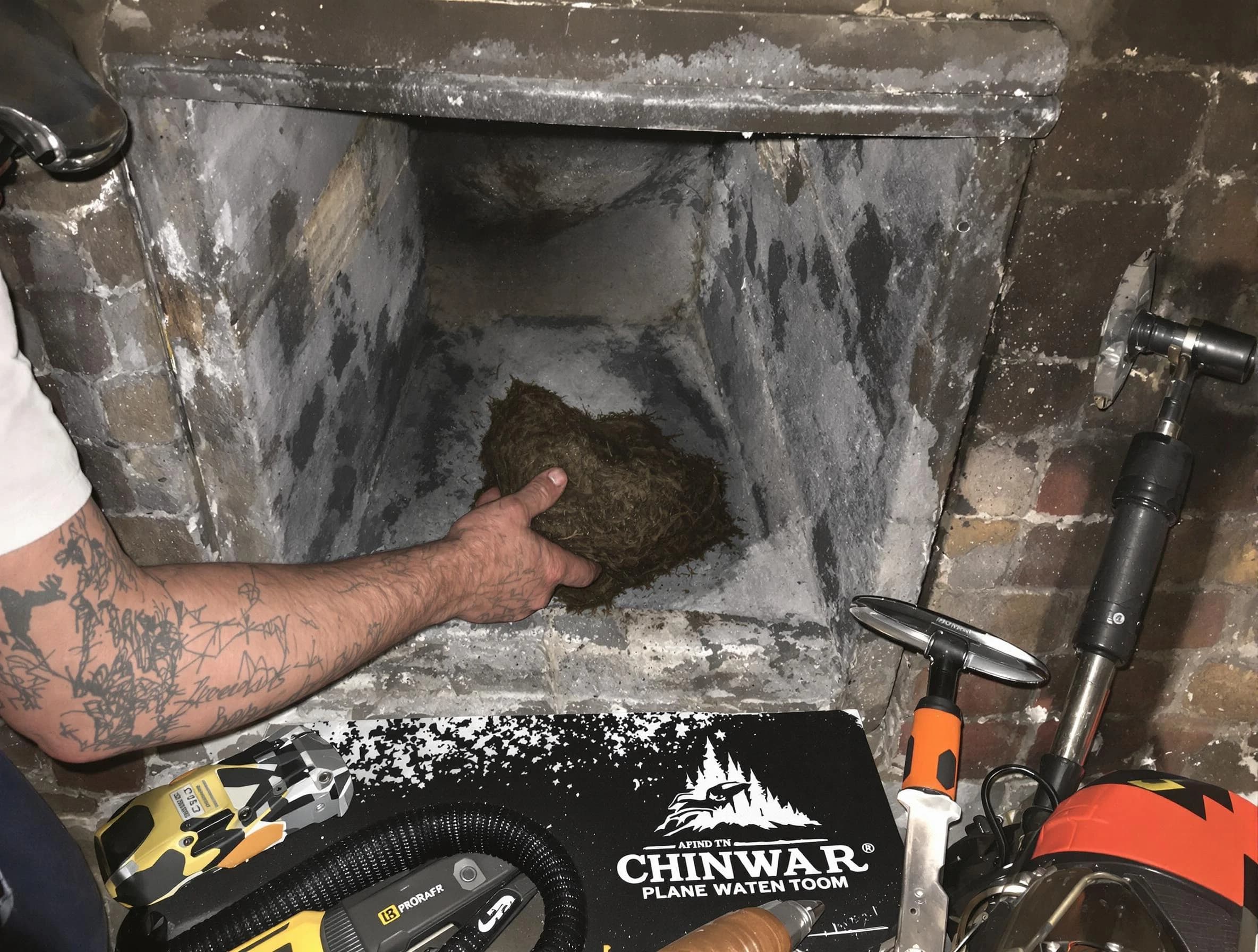 South Strabane Chimney Sweep safely removing debris and screening chimney in South Strabane, PA